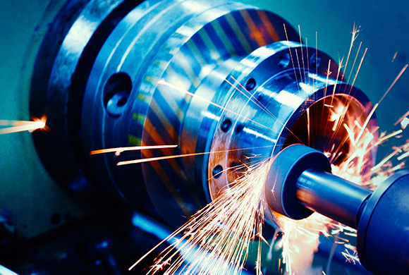 close-up of a metal lathe with sparks flying during machining process highlighting precision engineering techniques and metalworking tools in action 5 key methods