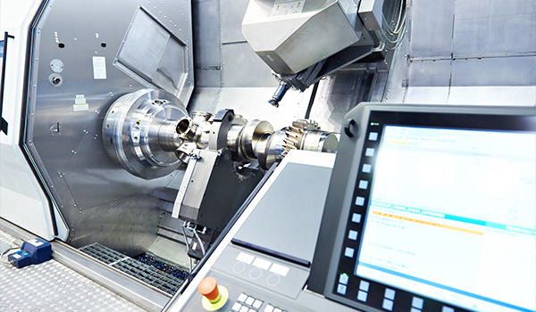 precision machining CNC machine with digital interface and rotating components showcasing advanced 3D manufacturing technology